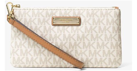 michael kors medium wristlet vanilla|Michael Kors jet set crossover.